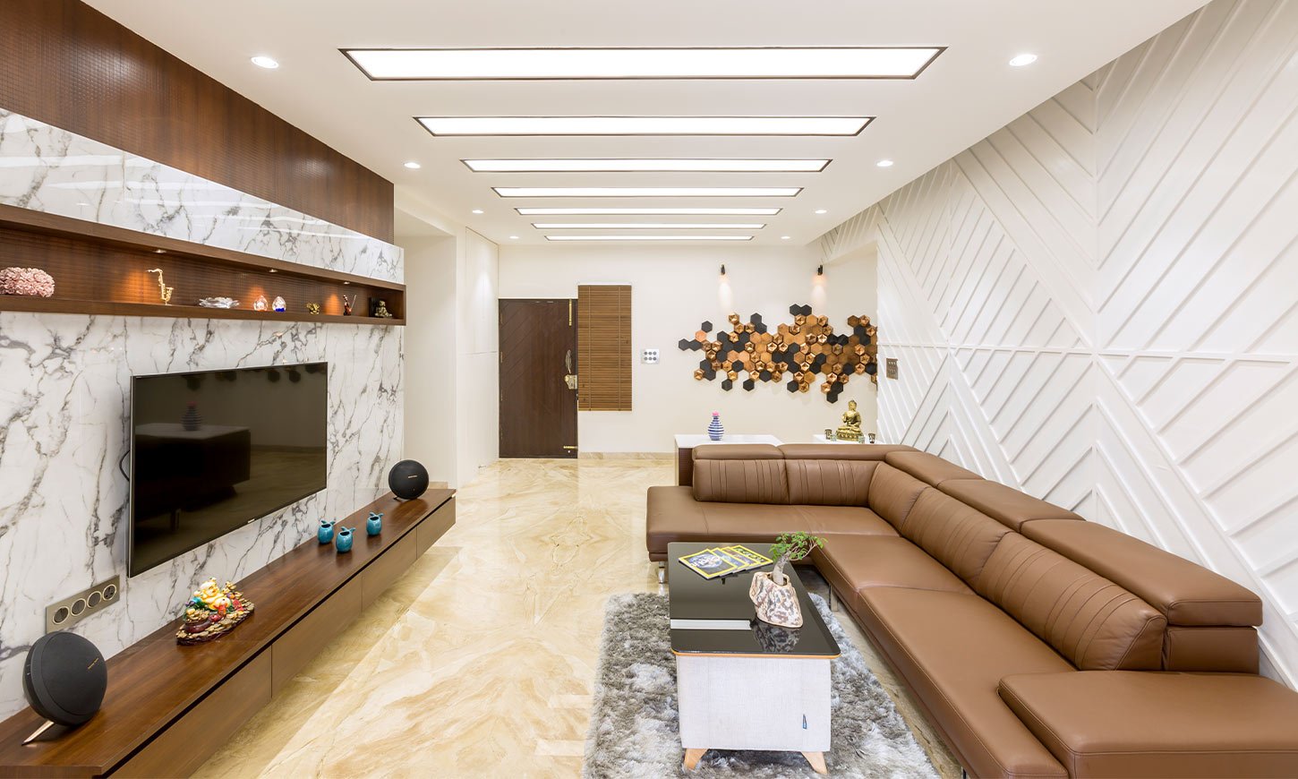 L shape sofa designed by Creative walls which is one of the top 5 interior designers in pune