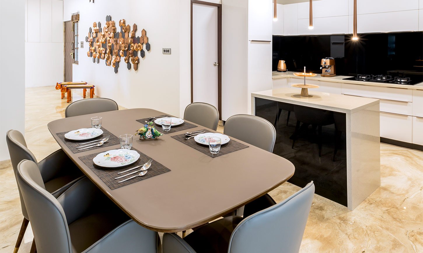 Grey dining table designed by top 10 interiors in pune